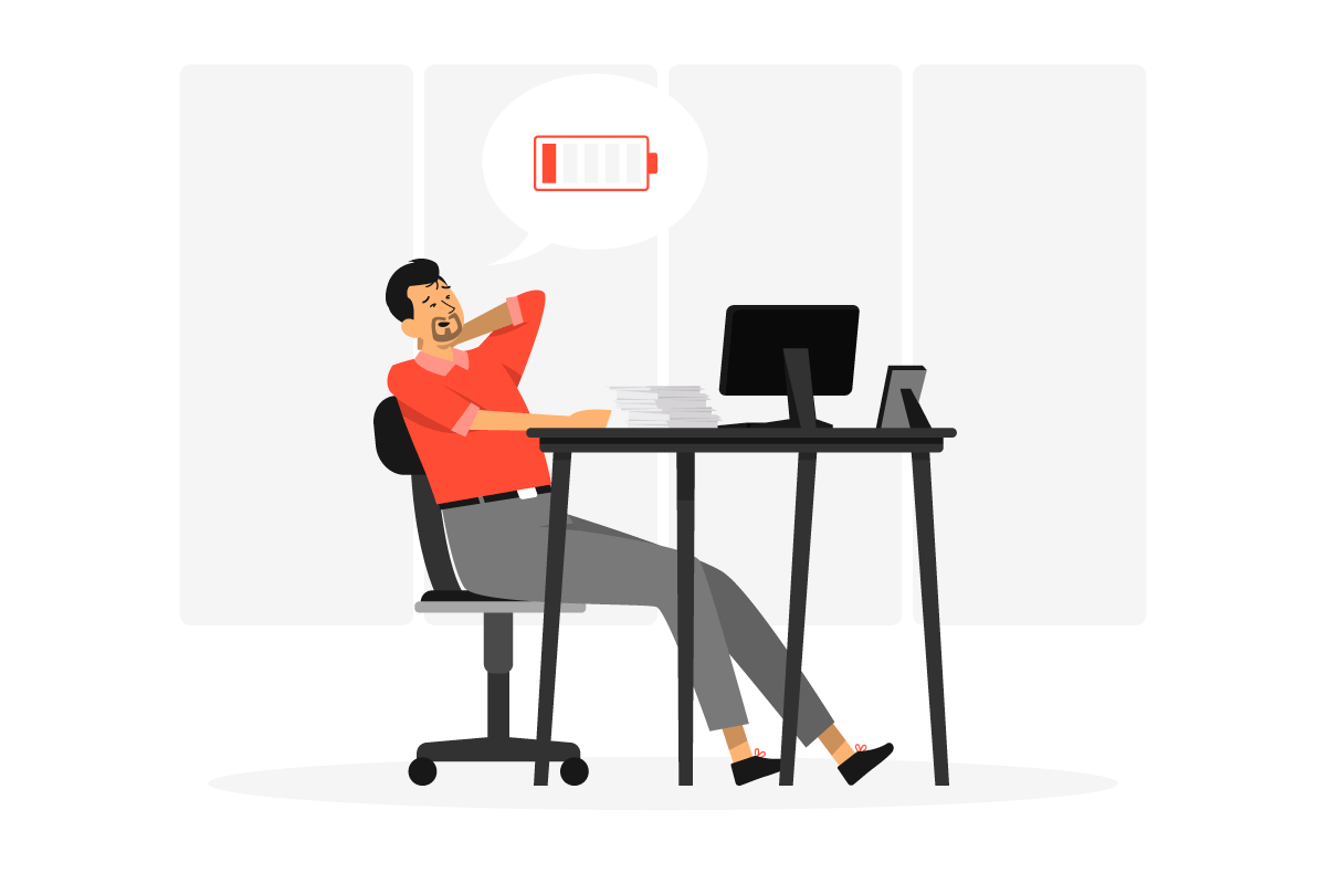 Illustration of a man yawning at his desk to represent low energy at work. 