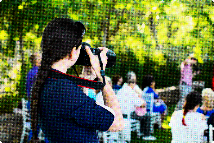 Image of a woman taking photos