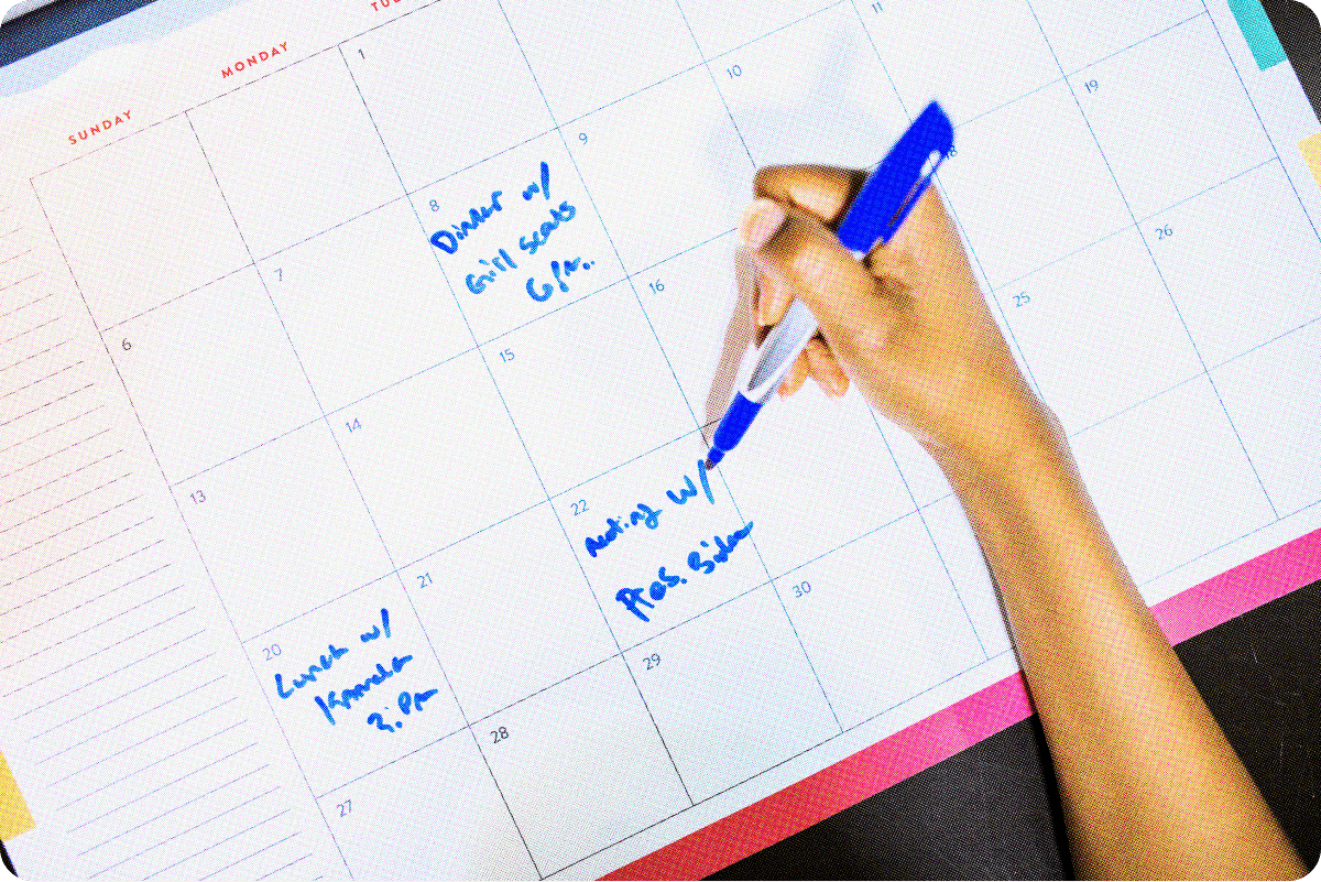 Image of a person filling out a calendar